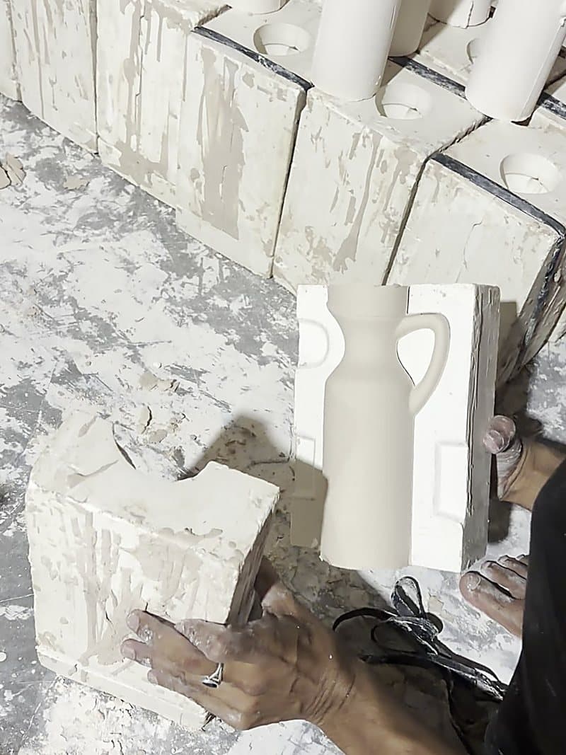 A plaster mould beside a freshly cast ceramic form at our Khurja unit